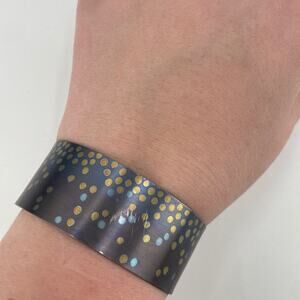 Spotted metallic cuff bracelet